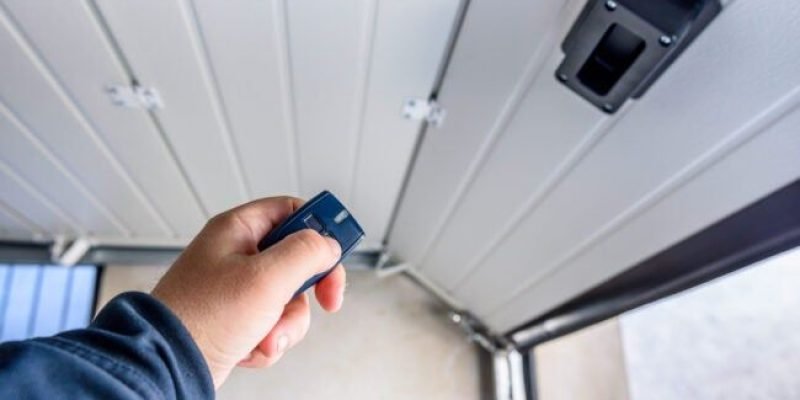 Spray These 5 Parts of Your Garage Door With White Lithium Now